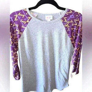 Lularoe large grey Randy baseball‎ T. Purple & yellow aztec sleeve, grey body.